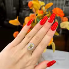 1–2ct Fancy Light Yellow Emerald Lab-Grown Diamond Halo Ring in 14K White Gold with White Baguette Accents