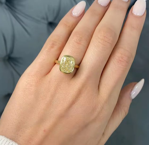 bezel-set cushion cut yellow lab-grown diamond ring in 14k yellow gold – 1 or 2 carats statement ring